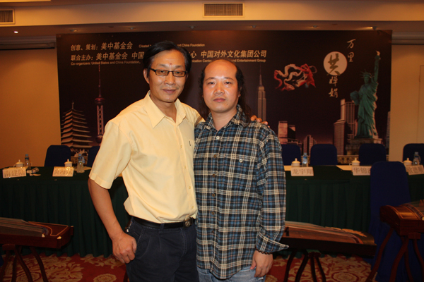 和世界华人艺术家协会副主席书法家欧德顺合影.jpg