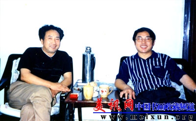 中央电视台书画院《东方美术》主编着名书画家李明泉先生与作者合影副本.jpg