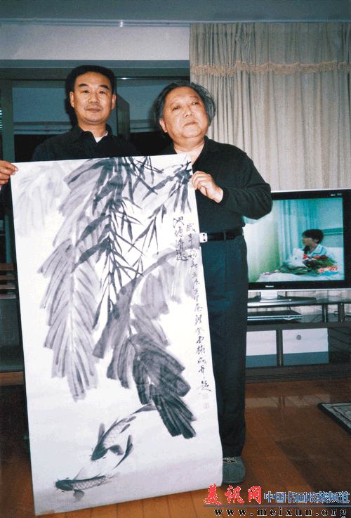与张登堂先生合影.gif