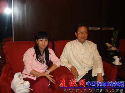 张惠臣与游泳名将五朵金花之一钱红在奥康奥运活动中合影.jpg